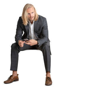 man in a suit sitting