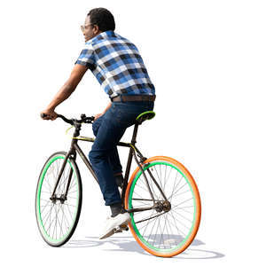 black man in a checkered shirt riding a bicycle