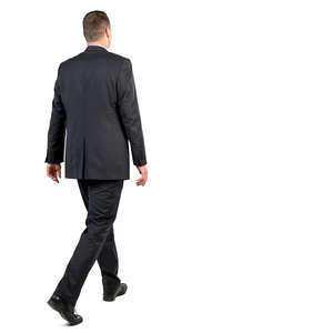 man in a black suit walking