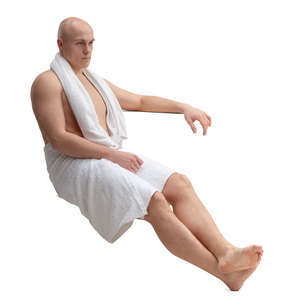 man sitting in the sauna