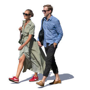 two young people walking and smiling