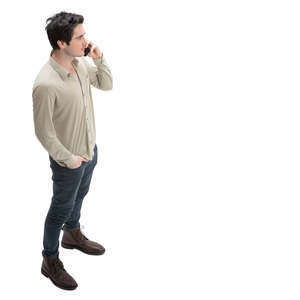 man standing and talking on a phone seen from above