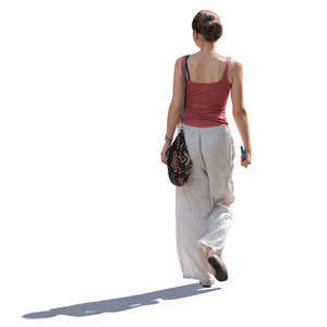 backlit woman walking on a sunny day