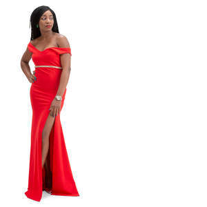 black woman in a red evening gown standing
