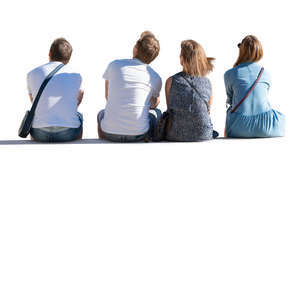 four people sitting seen from behind