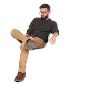 man sitting and texting