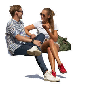 man and woman sitting and talking