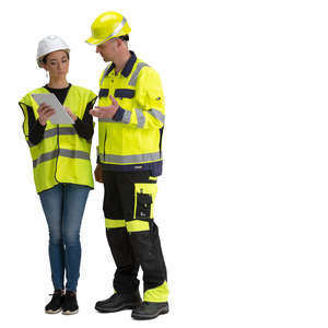 man and woman talking at a construction site