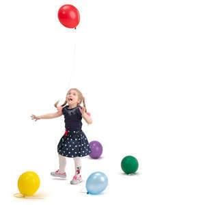 little girl playing with balloons
