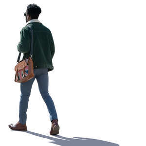 backlit black man walking