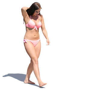 woman in a pink bikini walking 