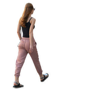 young woman walking hastily