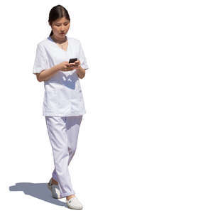 young asian doctor walking