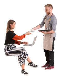 waiter passing coffee to a client