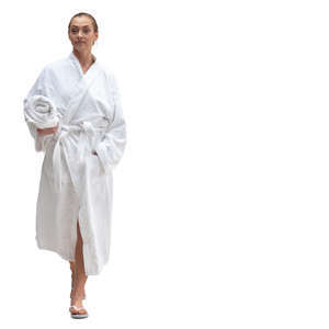 woman in a white bathrobe walking