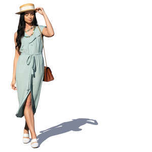 woman in a pale blue summer dress walking