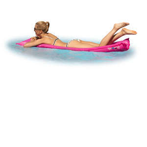woman lying on the pool mattress