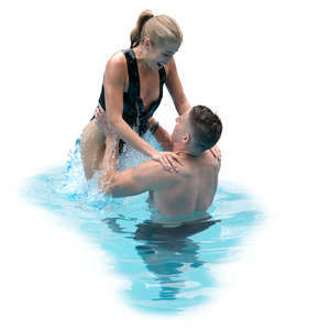 man and woman having fun in the pool