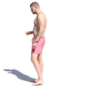 man in swim shorts standing