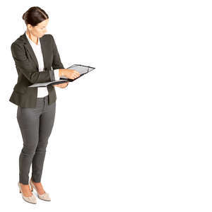 office worker standing and looking at some papers