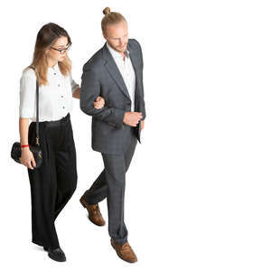 man and woman walkign arm in arm seen from above