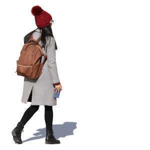 asian woman in an autumn coat walking