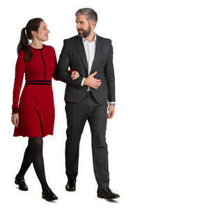 couple in formal clothes walking arm in arm