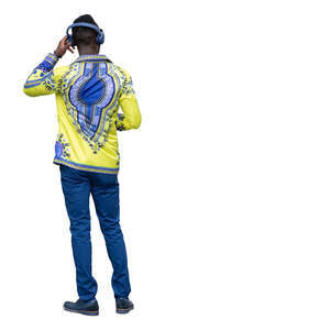 black man with headphones standing
