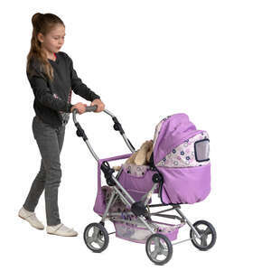 little girl playing with her toy baby carriage