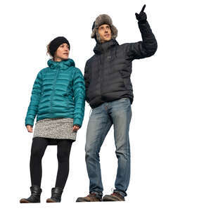 man and woman standing higher up and looking at smth