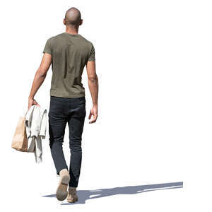 man with a small shopping bag walking