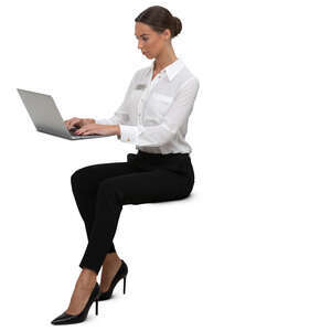 woman sitting and working with laptop