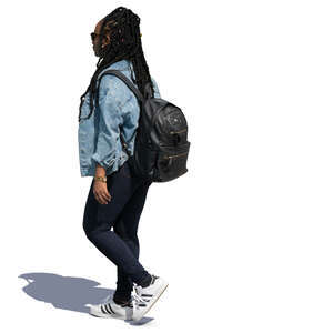 black woman with a backpack walking