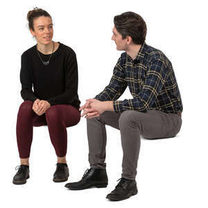 man and woman sitting and talking