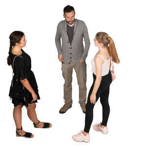 group of three people standing and talking