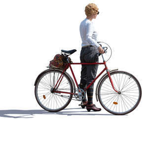 sidelit female cyclist in a vintage costume 