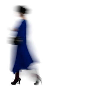 motion blur woman in a blue dress walking