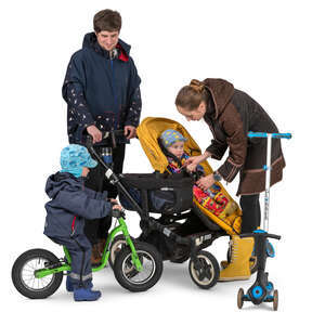 family with two kids and a stroller standing
