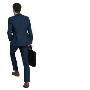 young businessman walking up the stairs