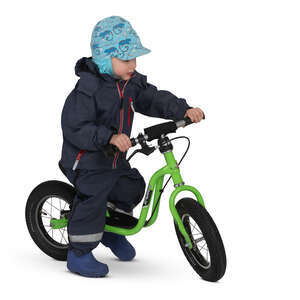 little boy riding his bike