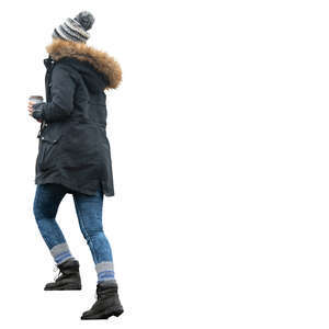 woman walking up the stairs in winter