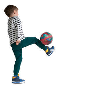 little boy playing football