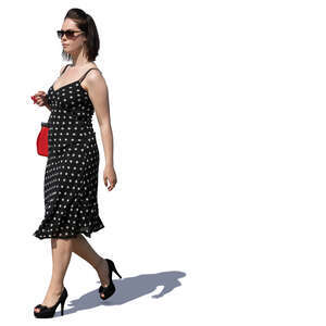 woman in a polka dot dress walking