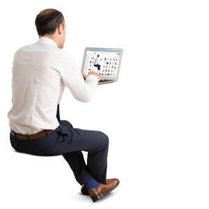 man working at a desk in office