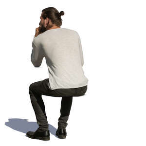 man sitting and leaning on a table