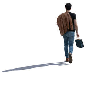 young backlit man with a small shopping bag walking