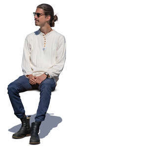 man sitting in sunlight
