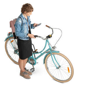 woman with a bicycle stopping and checking her phone
