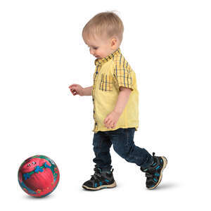little boy playing with a ball