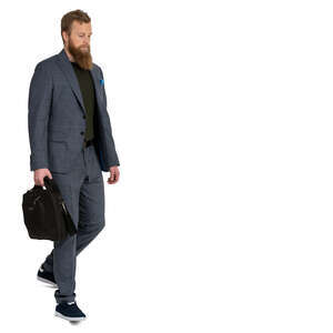 young man with a beard walking down the stairs